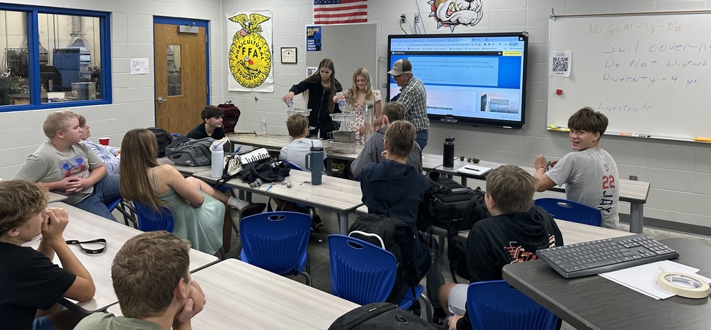 Jim C. teaching students about soil helth