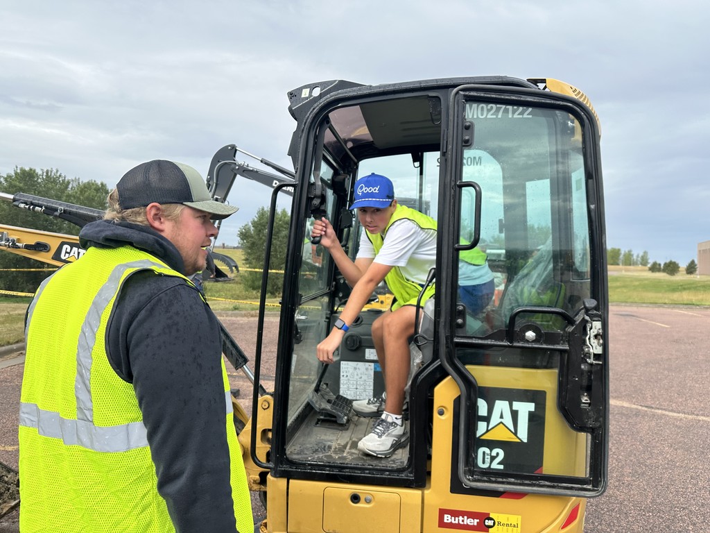 Grant E. in a Bobcat