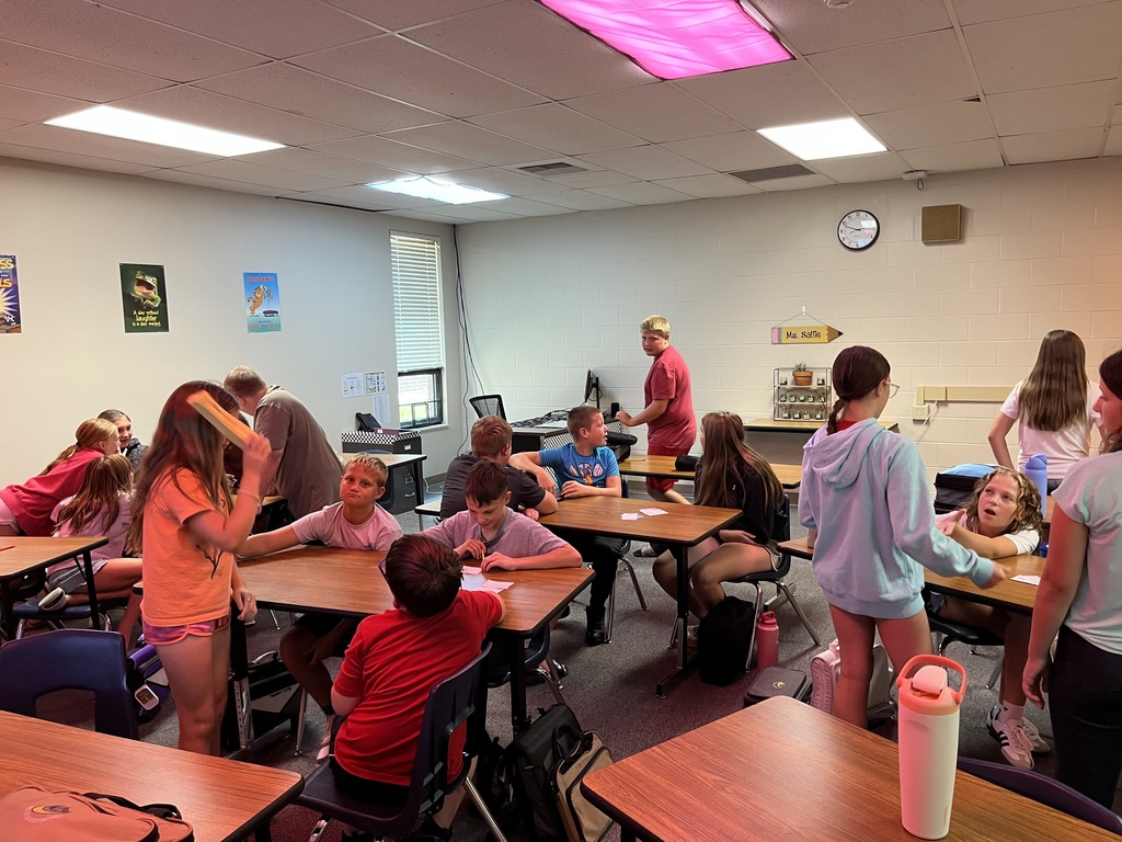 Students working in a classroom on digital citizenship