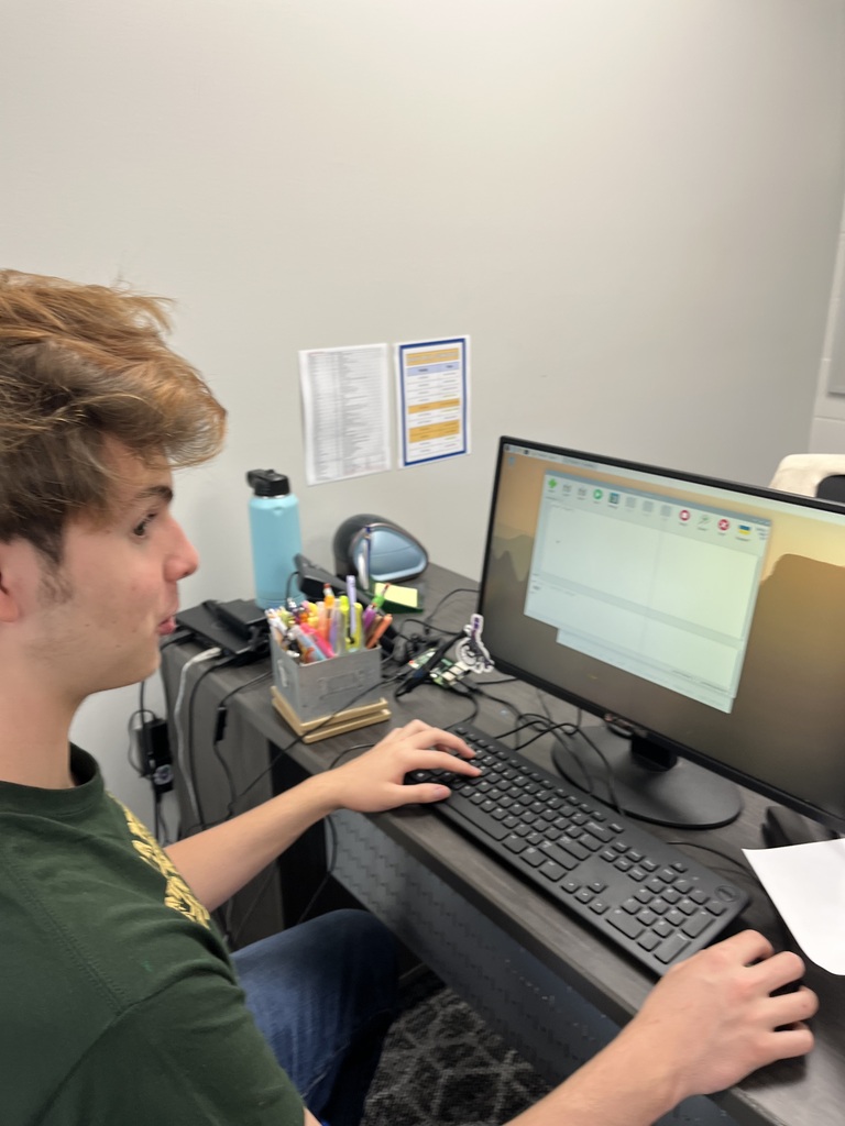 A Baltic School District student works at a desktop computer using the Thonny Python programming application during a hands-on computer science lesson.