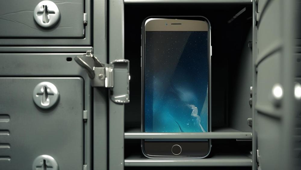 Locker with door ajar reveals a cell phone.