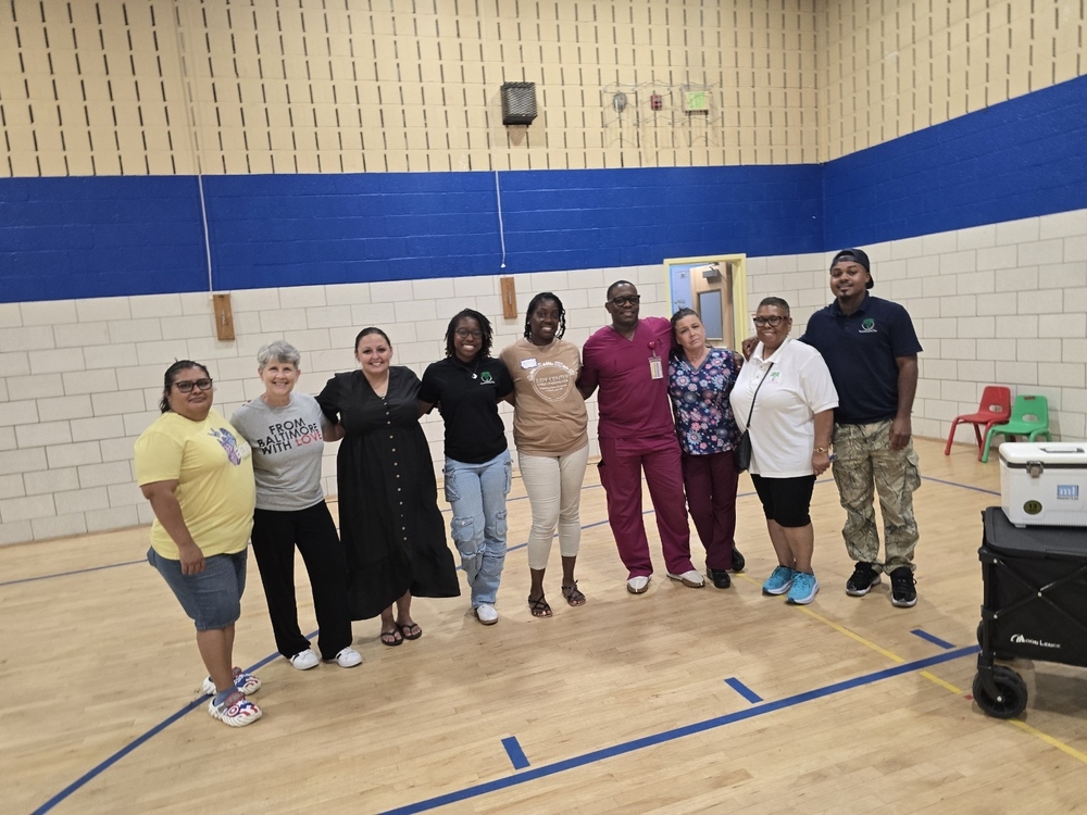 group of staff posing for a picture