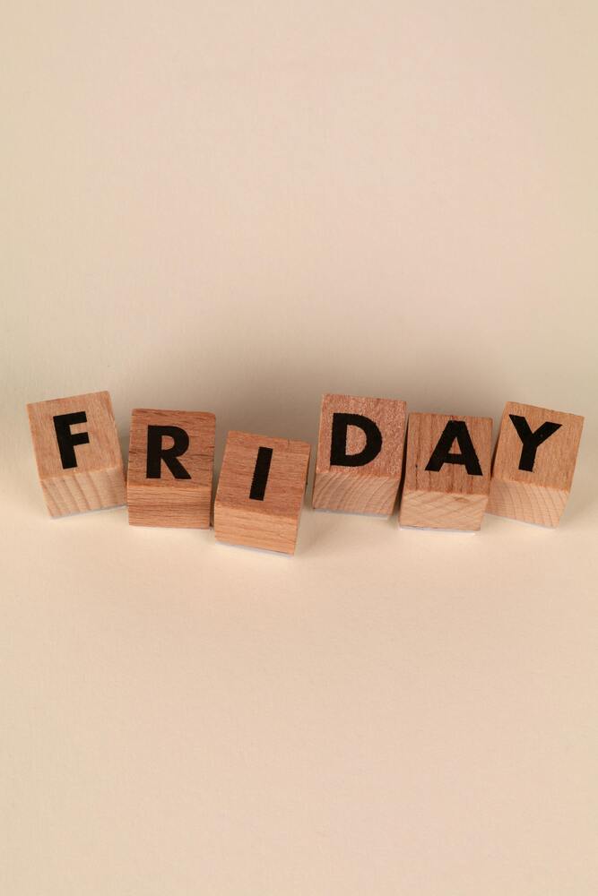 image of the word "Friday" being spelled out using blocks with black letters