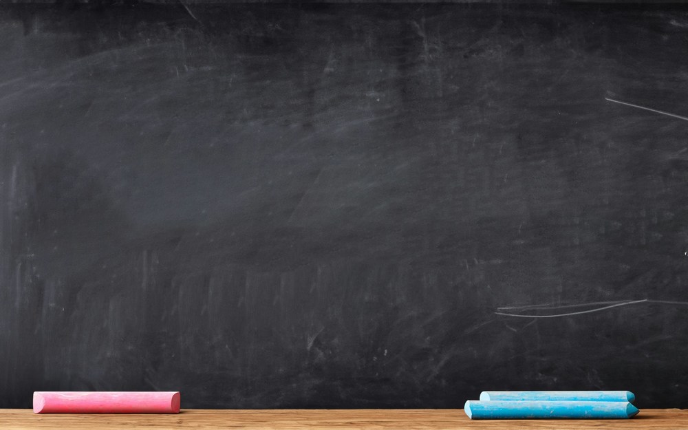 blackboard with two sticks of chalk