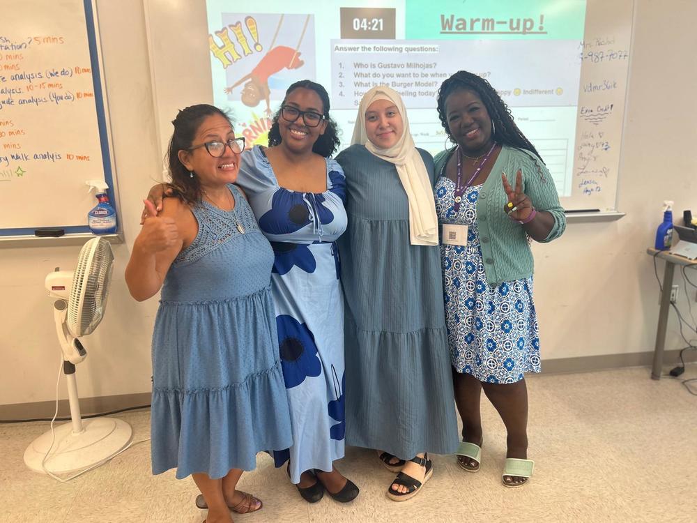 Staff poses for a group picture on the first day of school