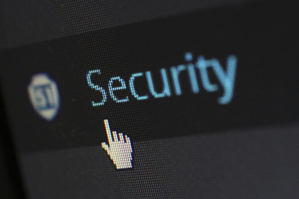 the word "security" is positioned on a computer screen with a cursor hovering over it