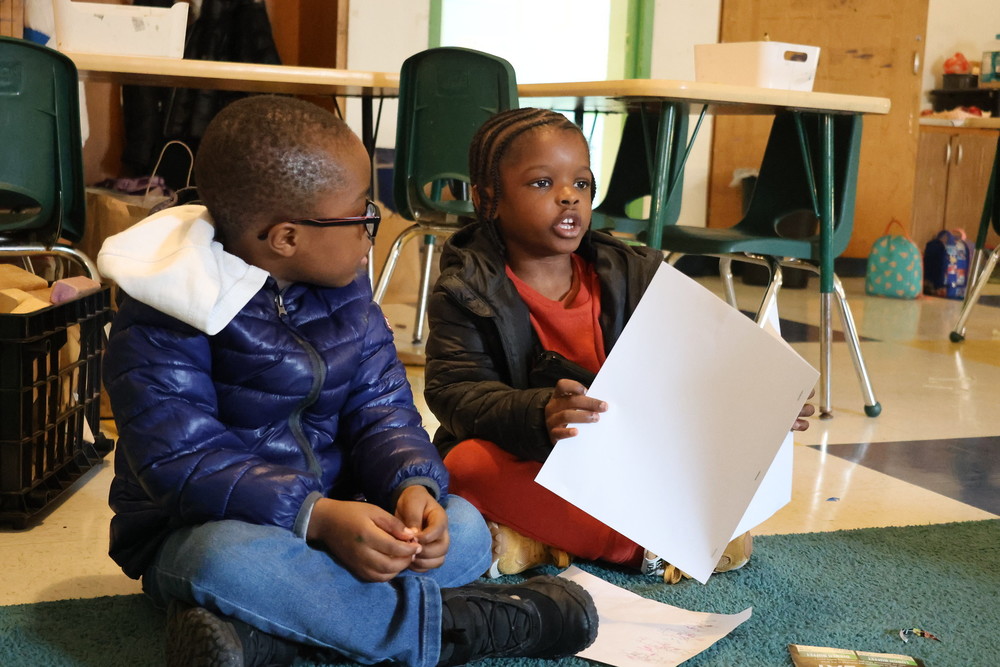 Creative City kindergartener presents to their class.
