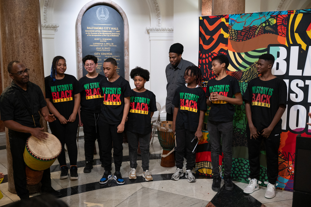 Students play traditional african drums at Mayor Brandon Scott's Black History Month Reception 2.20.25