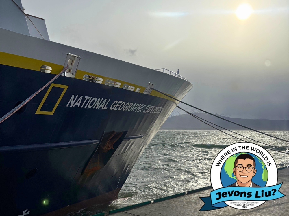National Geographic Boat with Jevons Liu graphic on the bottom right hand corner.