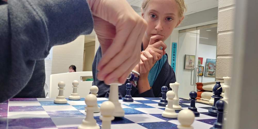 Rose Brown watched intently as her chess opponent makes their next move.