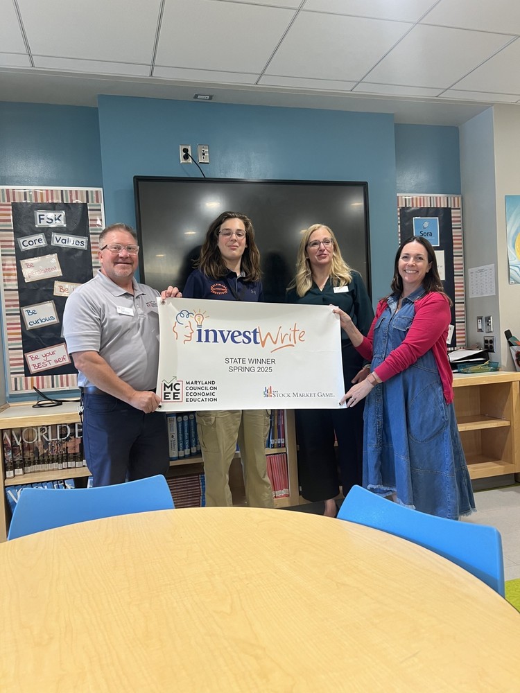 MCEE Director of Education Rick Jester, Johns Williams, MCEE Executive Director Julie Weaver, Teacher Felicity Ross