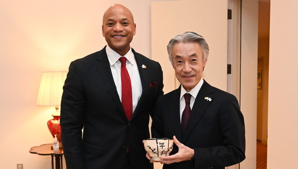 Maryland Governor Wes Moore and Ambassador Shigeo Yamada with a handcrafted ceramic tea bowl, “chawan,” created by a City Schools student
