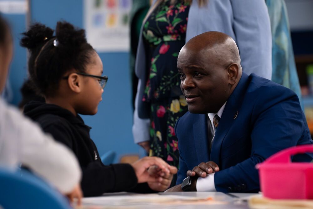 Dr. Dawson talking to student