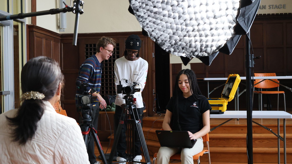 Student Media Team members conduct interviews at Baltimore City College High School