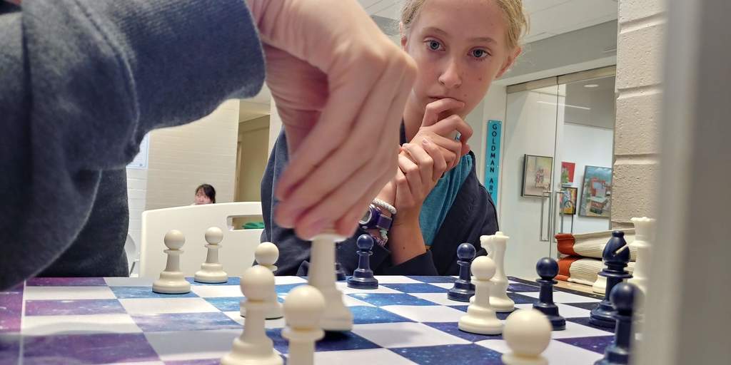Rose Brown watched intently as her chess opponent makes their next move.