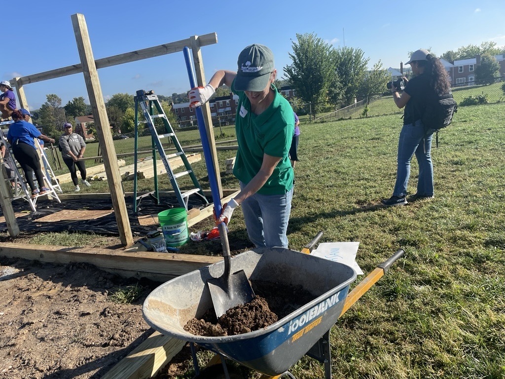 Volunteers helps put together a new playground at Sinclair Elementary. 