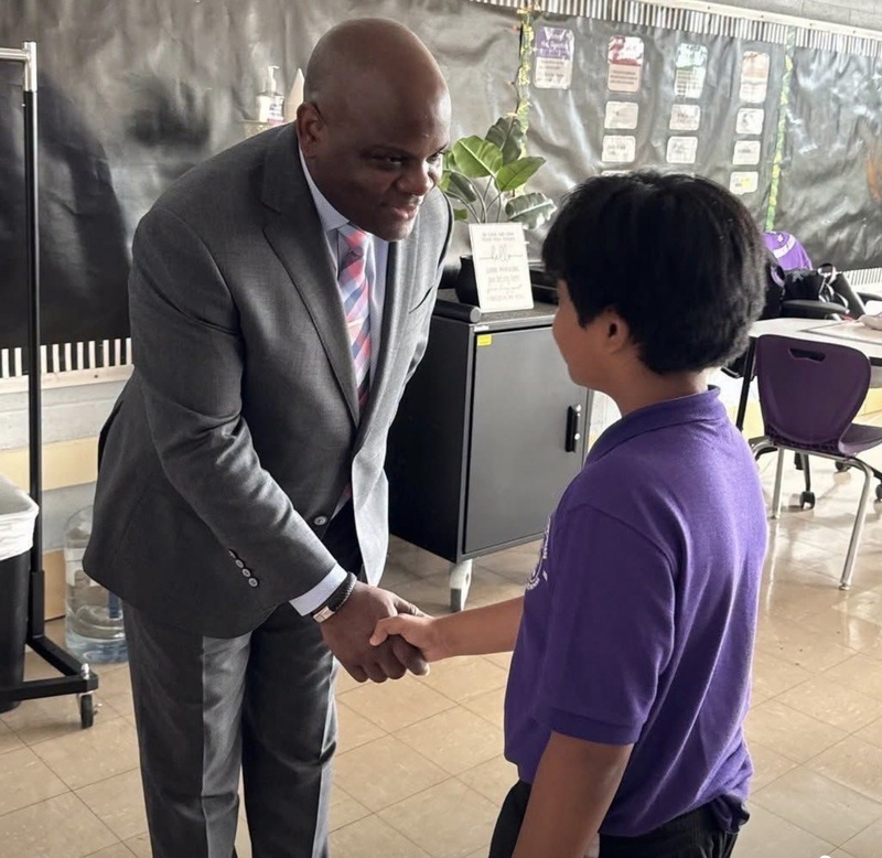 Dr. Dawson shaking hand