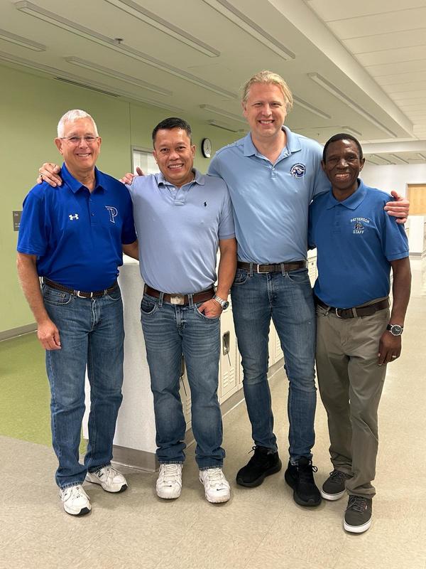 Staff poses for a group picture on the first day of school