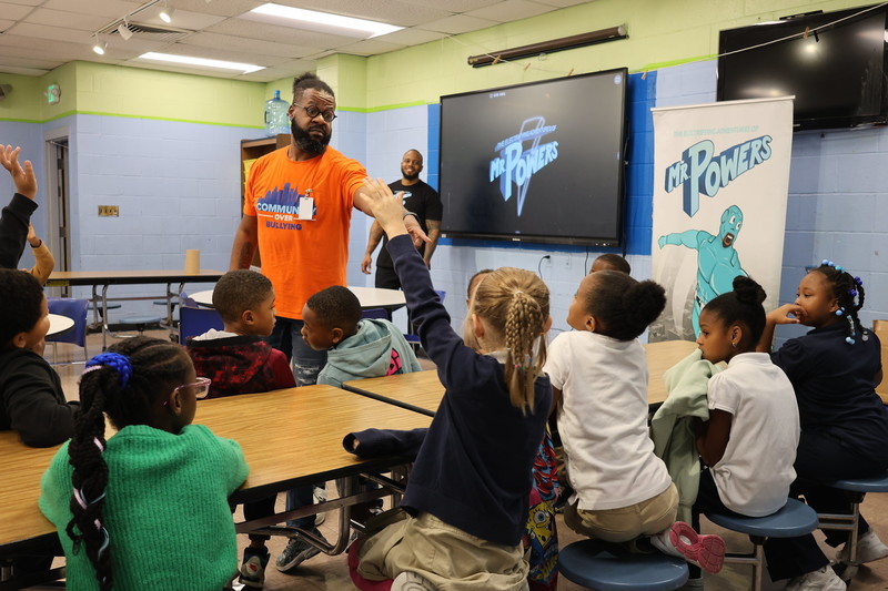 Mr. McGil teaches a class on Mr. Powers around anti-bullying