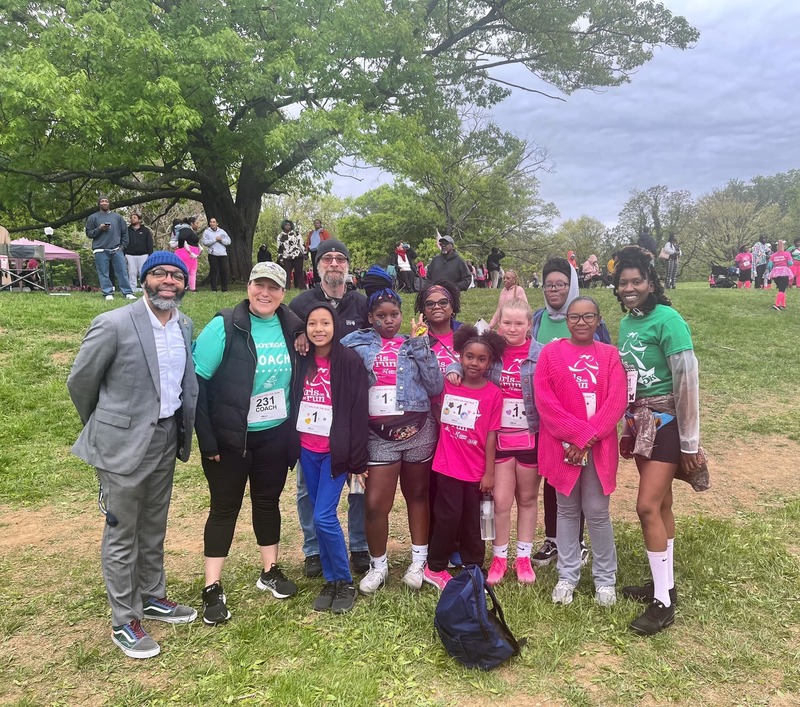 Schoolgirls run as part of the "Girls on the run" program