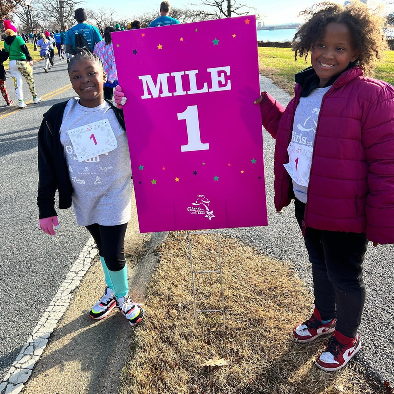 Schoolgirls run as part of the "Girls on the run" program.