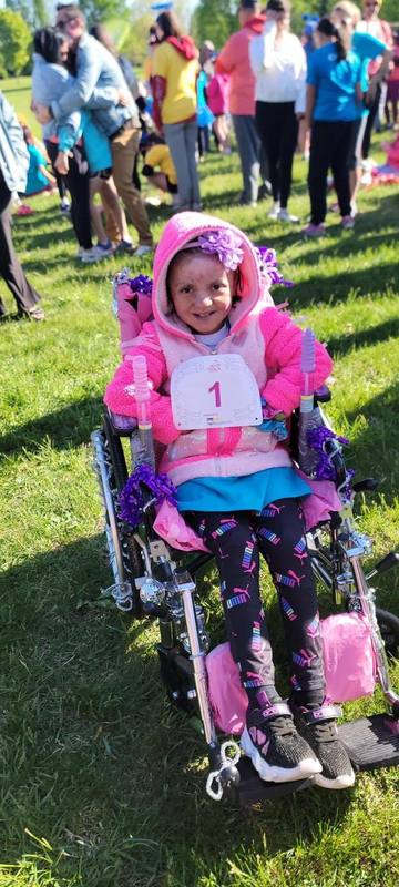 Schoolgirls run as part of the "Girls on the run" program.