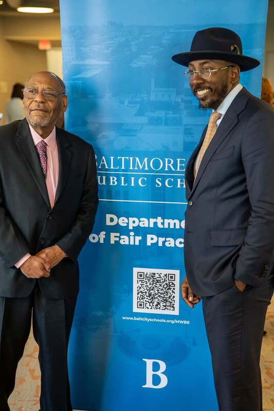 Commissioner Muhammad and Commissioner Kenyatta-Bey  pose for a picture