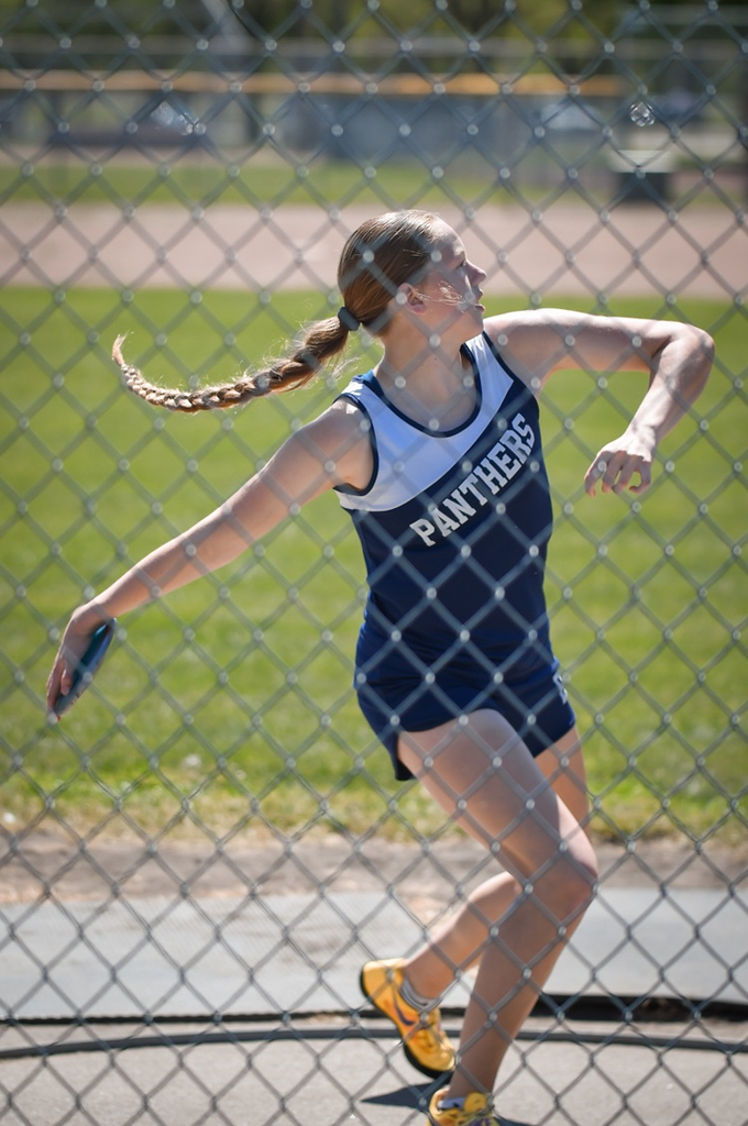 Emilyn throwing discus at EHC JH meet