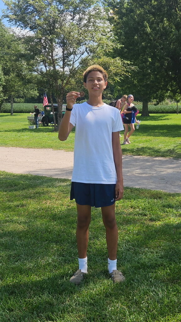 PJ with his medal. 