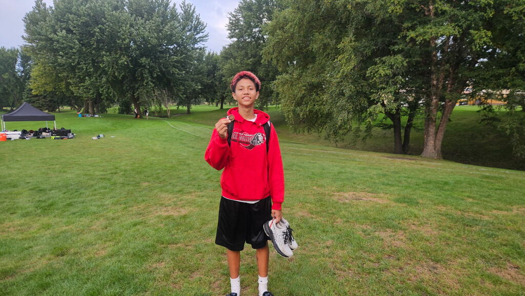 PJ with his medal. 