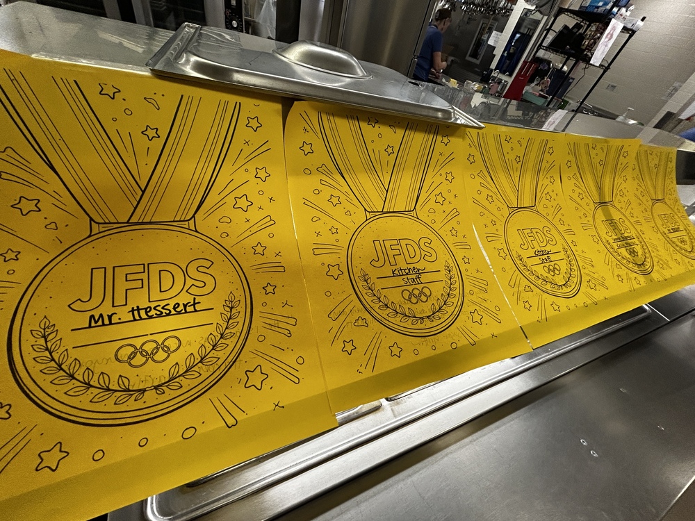 Gold Medals displayed in the hallway of JFDS