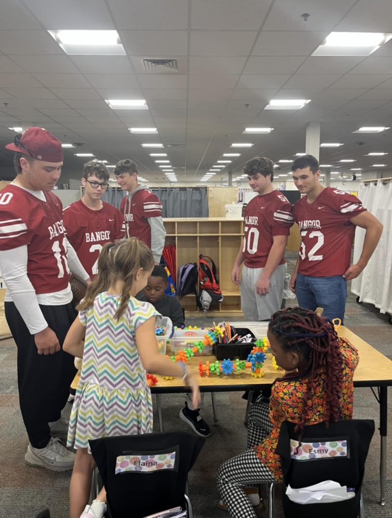 Abraham Lincoln School had a special visit from the Bangor High School Football Team this week! The players joined our students for morning recess, bringing lots of energy, smiles, and fun to the playground. Our students loved having the chance to play alongside these “big kids.” We’re cheering them on and wishing them the best of luck this season!  A big shout out to Mrs. Morris for organizing this! Next home game is Friday, Oct. 10 vs. Windham at 7pm. GoRams!