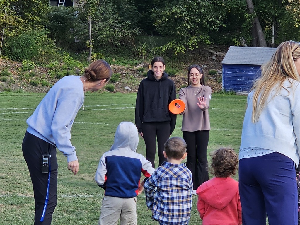 seventh and eighth graders from the James F. Doughty School gathered on the middle school's soccer field to volunteer as coaches for the Vine Street Pre-K students