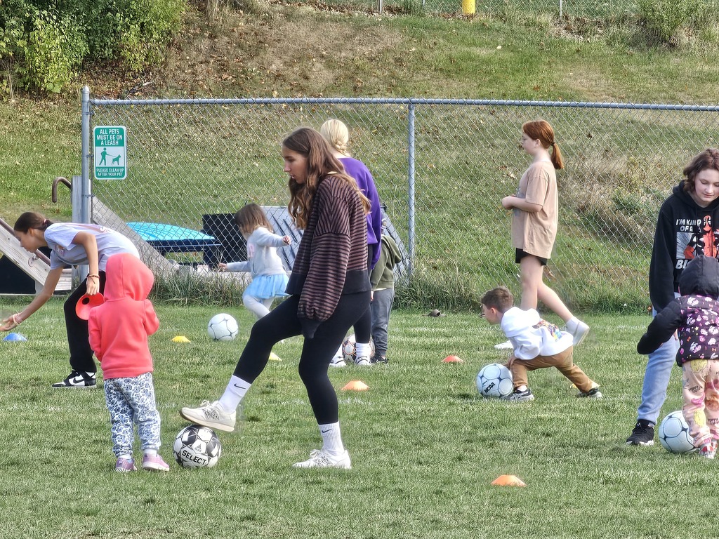 seventh and eighth graders from the James F. Doughty School gathered on the middle school's soccer field to volunteer as coaches for the Vine Street Pre-K students