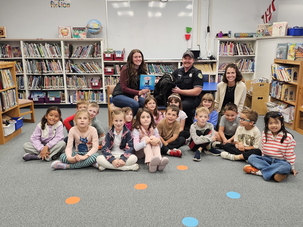 Pre-K, kindergarten, and 1st grade students at Fruit St. enjoyed a visit from Author Jessica Libby and her husband, Bangor Police Department Officer Libby, and the K-9 police dog Jesi.  The students enjoyed listening to Jessica read her story, The Adventures of K-9 Jesi: Jesi's First Day of School. The story was inspired by Officer Libby's real-life K-9.  The students loved hearing about the role of Jesi and how she and Officer Libby keep the Bangor community safe.