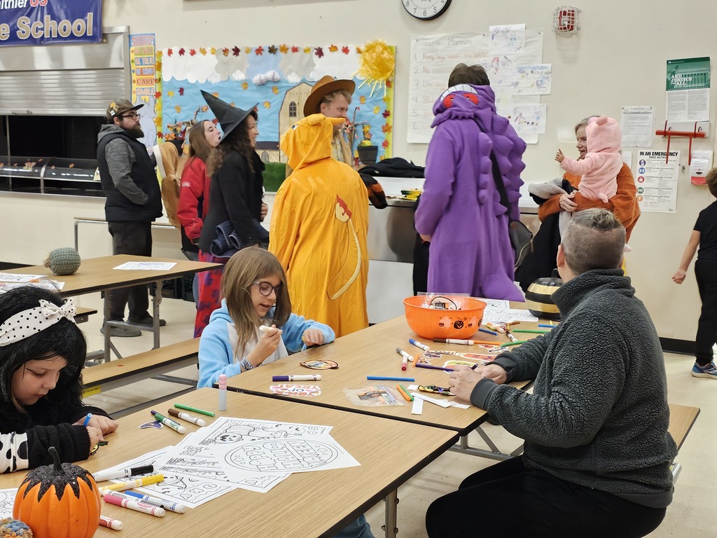 Families came together to shop, play games, and enjoy a variety of fun activities throughout the school.
