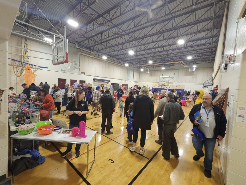 Families came together to shop, play games, and enjoy a variety of fun activities throughout the school.