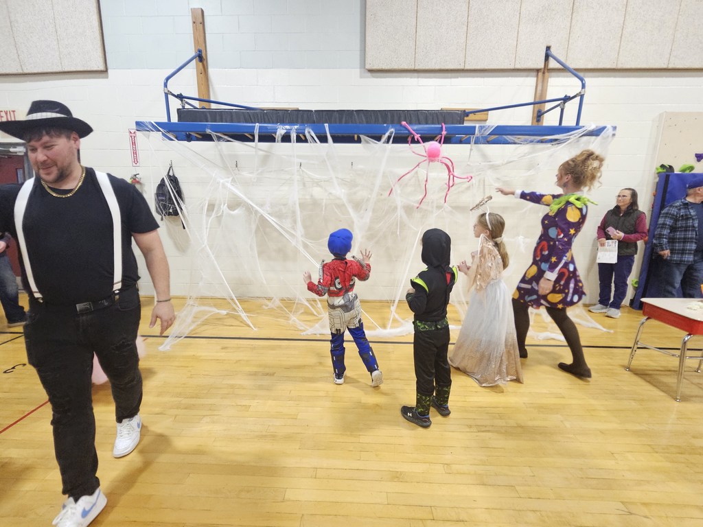 Families came together to shop, play games, and enjoy a variety of fun activities throughout the school.