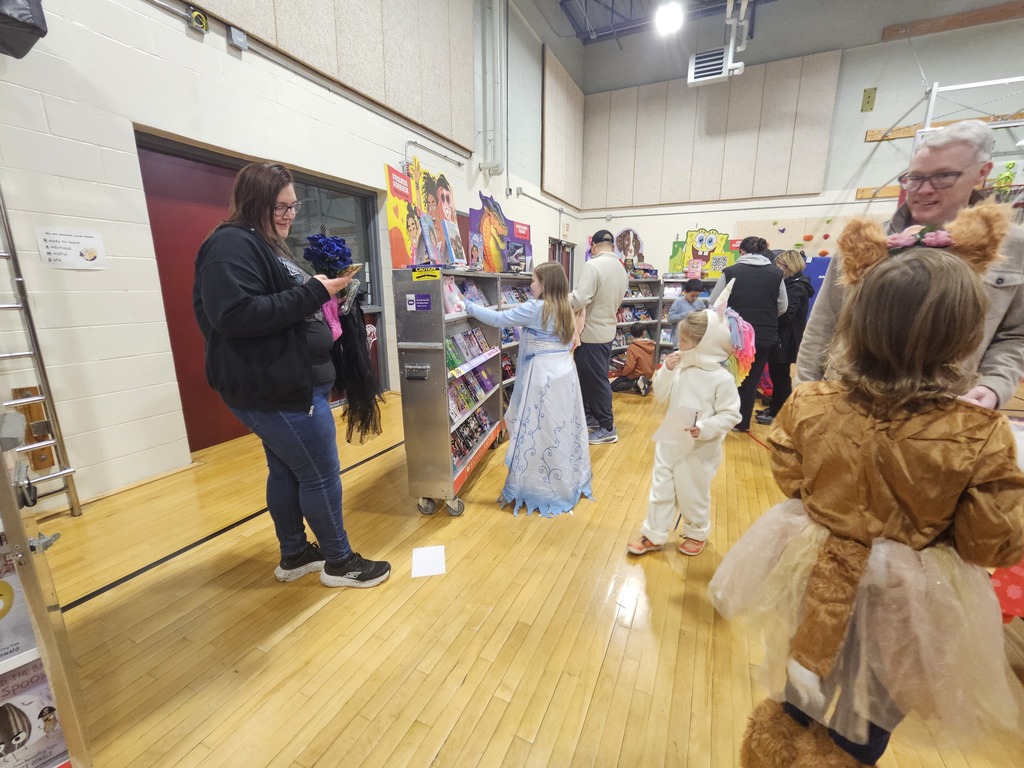 Families came together to shop, play games, and enjoy a variety of fun activities throughout the school.