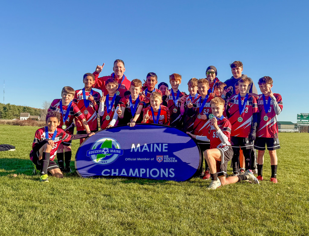 Congratulations to the Bangor Boys U12 Soccer club team who won the state championships on November 2! The team defeated Falmouth 5-2!  Player from Mary Snow: Sam Blanchard Players from William S. Cohen: Sean Owolabi, Isaac Klein, Auckland Dwyer.  Players from James F. Doughty: Doughty-Dinh Duong, William Sprague, Maxwell Strout, Zane Zezima.  The team also consists of players from All Saints and Orono.  Coached by Ben Sprague.  #wearebangor
