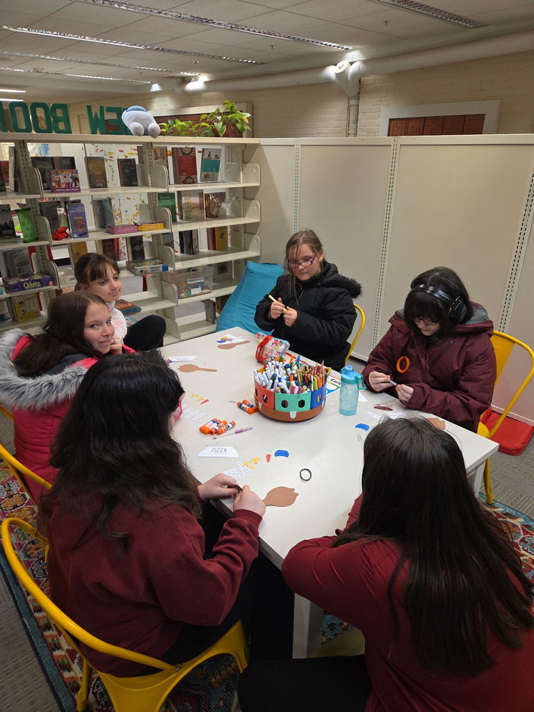 In the spirit of Thanksgiving, we want to give a huge shout-out to the Bangor Public Library for the amazing services and programs they offer our community! The Cohen Middle School Aspirations program took a community trip to the Bangor Public Library on Friday afternoon, coordinated by the Bangor librarians. Students listened to a read-aloud story about a playful turkey and engaged in an enjoyable group craft activity. They also had the chance to learn how to seek assistance, discover interesting books, and check some out to borrow. Accompanied by a few Best Buddies, the students had a fun-filled afternoon out in the community.