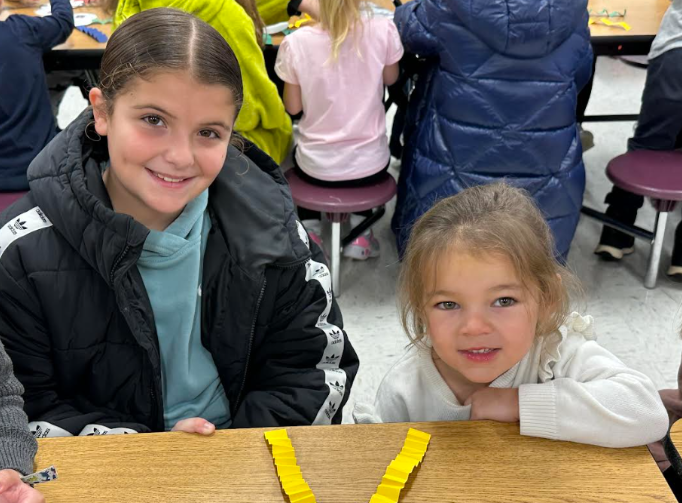 Fifth-grade students from Mary Snow School arrived at Fruit Street to spend time working with our Pre-K, kindergarten, and first-grade students. Together, the students collaborated to create a snowman, sharing ideas and teamwork throughout the activity. Afterward, they enjoyed time reading a story together, building connections and fostering a love of learning across grade levels.