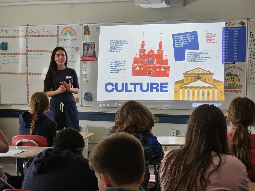 On Wednesday, Doughty students participated in a multicultural day featuring presentations from all over the world. Students traveled to different countries (classrooms) to learn about diverse cultures. Throughout the morning groups visited places like Nigeria, Uzbekistan, Bulgaria, Spain, China, and Lebanon. These presentations were run by people in the Bangor-area community, including multilingual students and teachers from Bangor High School, members of Chispa, the Bangor Chinese School, the Maine Multicultural Center, the University of Maine, and Blackbird Beats from the Children’s Museum and Theater of Maine.