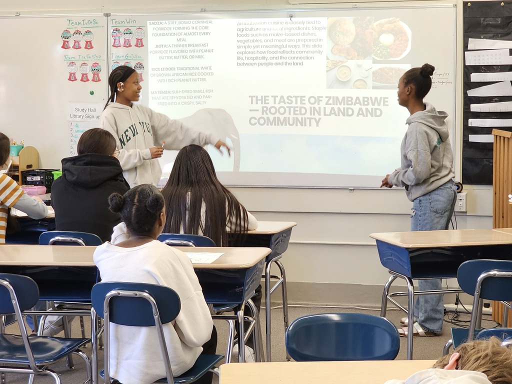On Wednesday, Doughty students participated in a multicultural day featuring presentations from all over the world. Students traveled to different countries (classrooms) to learn about diverse cultures. Throughout the morning groups visited places like Nigeria, Uzbekistan, Bulgaria, Spain, China, and Lebanon. These presentations were run by people in the Bangor-area community, including multilingual students and teachers from Bangor High School, members of Chispa, the Bangor Chinese School, the Maine Multicultural Center, the University of Maine, and Blackbird Beats from the Children’s Museum and Theater of Maine.