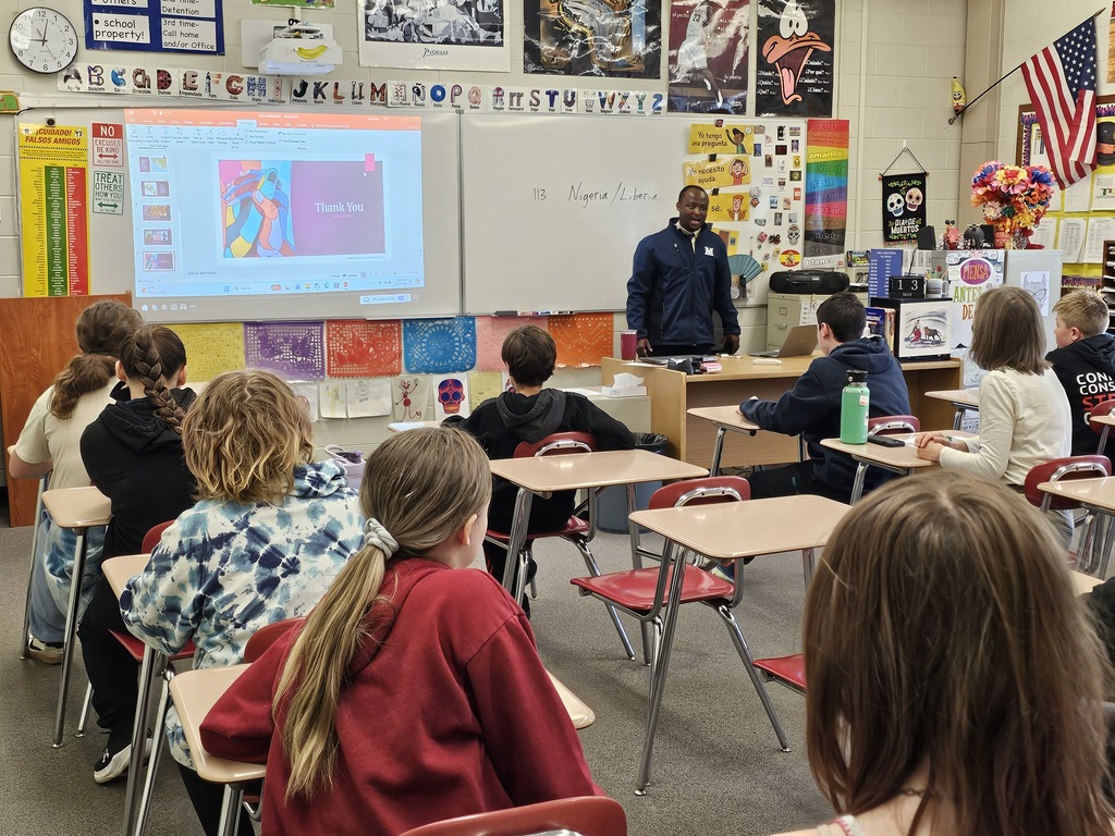 On Wednesday, Doughty students participated in a multicultural day featuring presentations from all over the world. Students traveled to different countries (classrooms) to learn about diverse cultures. Throughout the morning groups visited places like Nigeria, Uzbekistan, Bulgaria, Spain, China, and Lebanon. These presentations were run by people in the Bangor-area community, including multilingual students and teachers from Bangor High School, members of Chispa, the Bangor Chinese School, the Maine Multicultural Center, the University of Maine, and Blackbird Beats from the Children’s Museum and Theater of Maine.