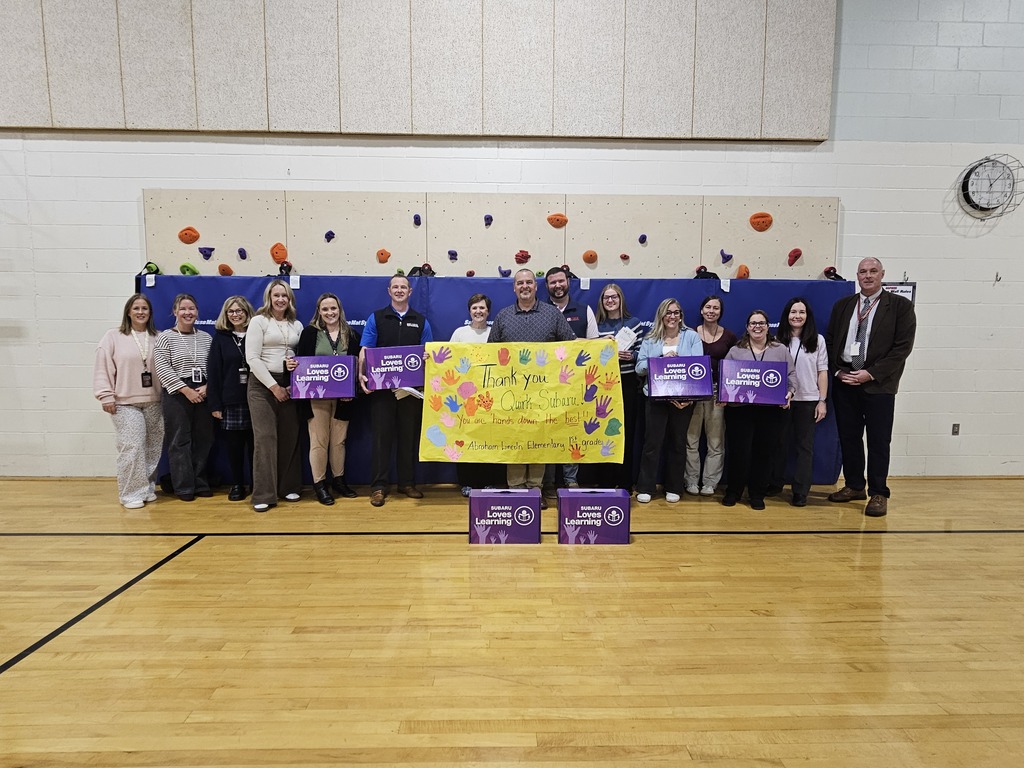 Teachers from the Abraham Lincoln School and Staff from Quirk Subaru pose for a picture. Thank you to @quirksubaru and @adoptaclassroom for supporting the Abraham Lincoln school. Your generous donation will go a long way to help our students succeed! #SubaruLovesLearning #wearebangor