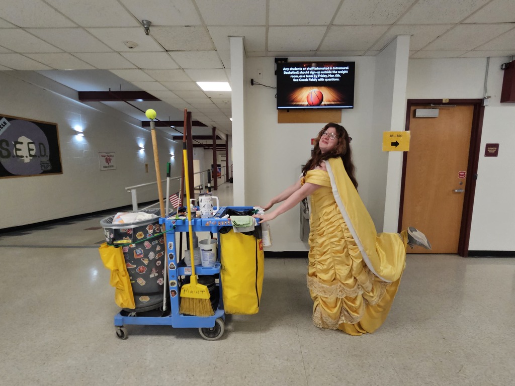 BHS Custodian dressed up as Belle for a theme day.