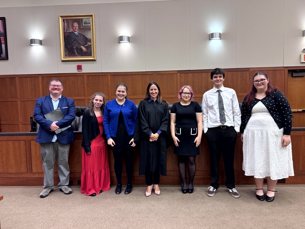 Today, members of the BHS Chorus had the honor of performing America the Beautiful, My Country 'tis of Thee and the National Anthem at a U.S. Citizenship Ceremony at the Bangor Federal Building. We are proud of our students for helping welcome our nation's newest citizens and representing BHS with pride, professionalism, and respect.  Congratulations to all who took the Oath of Citizenship today! #WeAreBangor  Pictured: Members of the BHS Chorus, Chorus Director Mr. Colin Graebert, and Justice Stacey D. Neumann