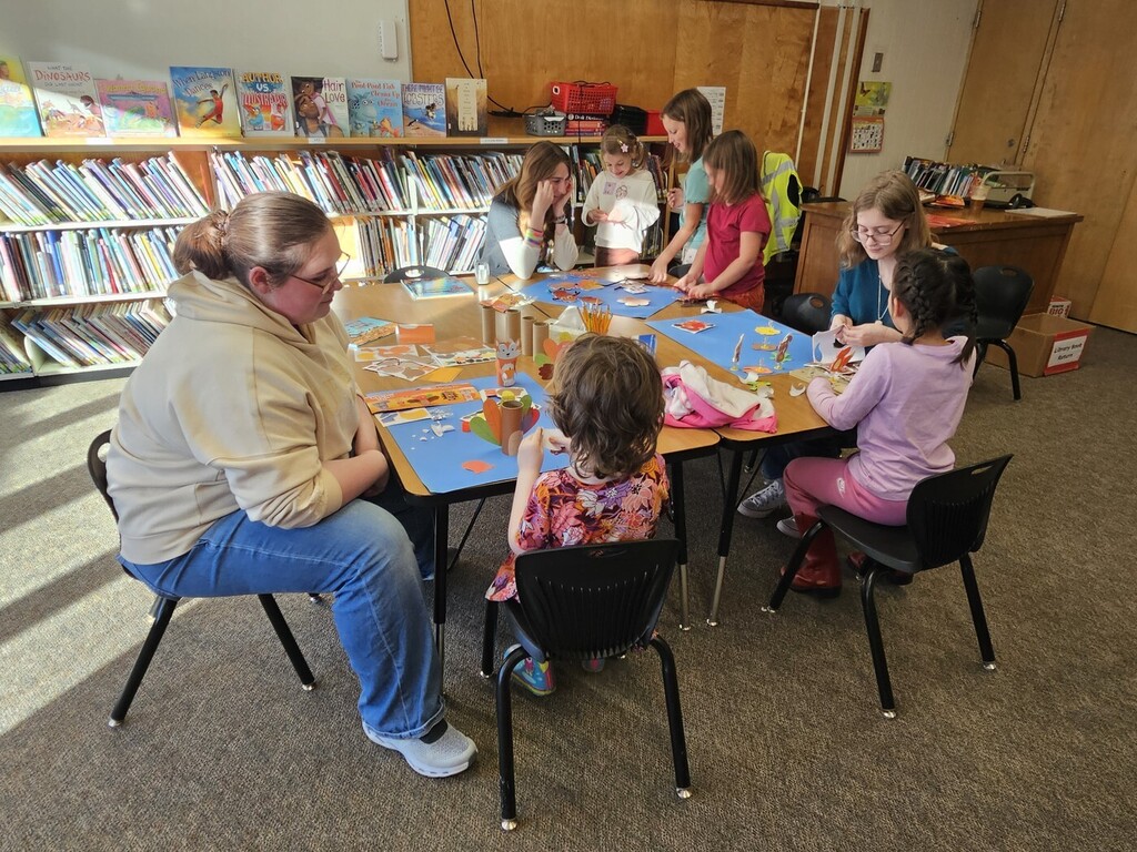 We are excited to share that our 14th Street kindergarten curriculum night was a wonderful success! We had 14 out of 22 families attend, representing approximately 64% of our kindergarten families! It was a fantastic evening filled with learning, connection, and opportunities for families to learn more about what their children are experiencing in kindergarten. While parents participated in the curriculum presentations, students enjoyed arts and crafts and reading books with wonderful volunteers from our high school's National Honor Society. A special thank you to Sophie Mattingly, Ava Rigler, and Kaelyn Phinney, our student volunteers, and Ray Phinney, District Communications Director, for helping make the evening such a success! We also want to extend our heartfelt appreciation to Mrs. Coopersmith and Mrs. Robinson for their time, preparation, and dedication to making this a meaningful evening for our families. Thank you to all the families who joined us! Curriculum materials were sent home to all kindergarten families, including those who were unable to attend, so everyone has access to the information shared during the evening. If you have any questions about the curriculum or materials, please don't hesitate to reach out to your child's teacher. We appreciate your continued partnership in making kindergarten a wonderful year of learning and growth! If you are interested in getting involved with the BSD Mentoring Program, please contact Mr. Phinney at rphinney@bangorschools.net
