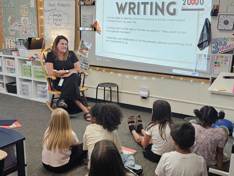 3rd Grade Teacher at Downeast School interacting with students in the classroom.